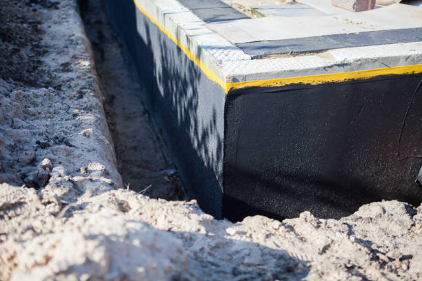 Professional Waterproofing technician working in Glen Ellyn, IL